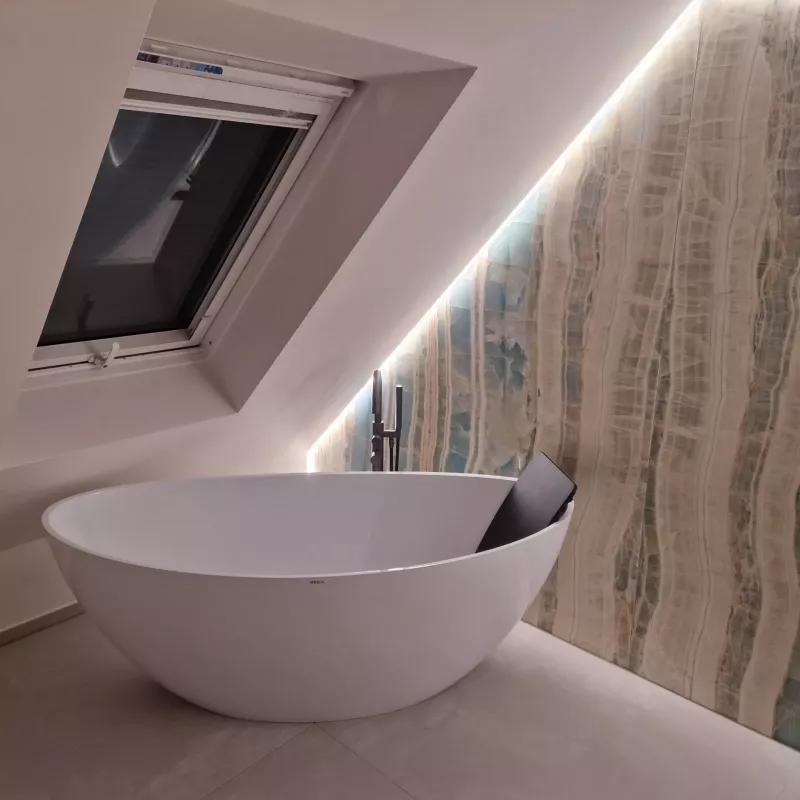 Komplettsanierung eines Düsseldorfer Dachgeschosses inklusive Luxus-Badmodernisierung und Großformatfliesen